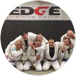 edge training center jiu jitsu students posing for a fun group picture